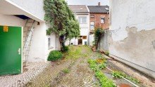 R�ckansicht Reihenhaus in Aken mit Renovierungsbedarf