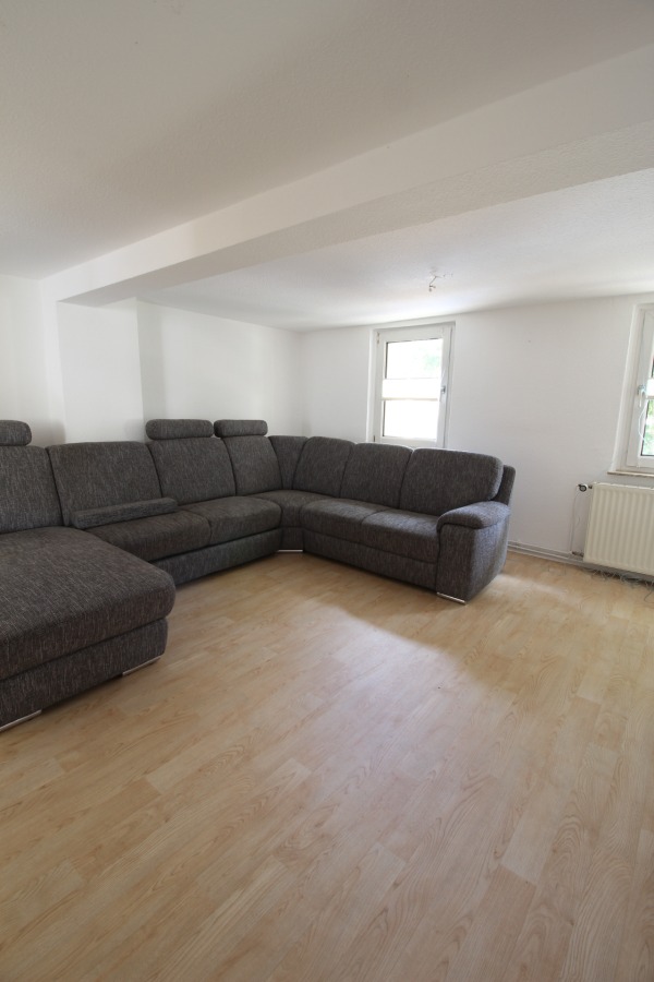 Wohnzimmer mit Wohnlandschaft Etagenwohnung Radegast