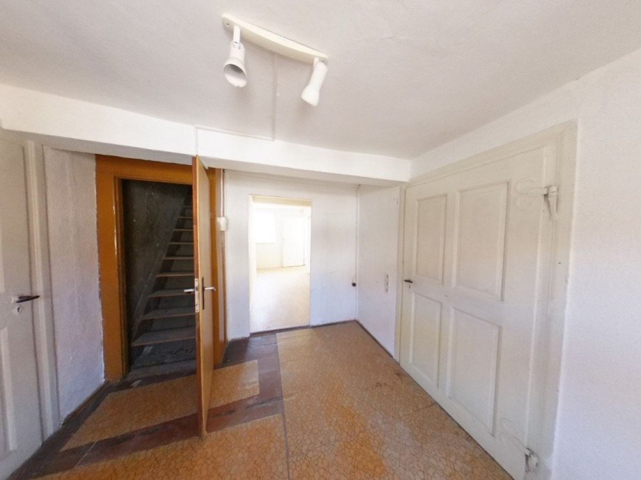 Aufgang zum Boden Etagenwohnung Radegast