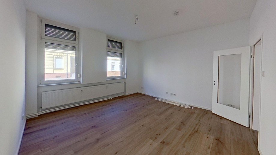 Wohnzimmer Erdgeschosswohnung K�then/ Anhalt