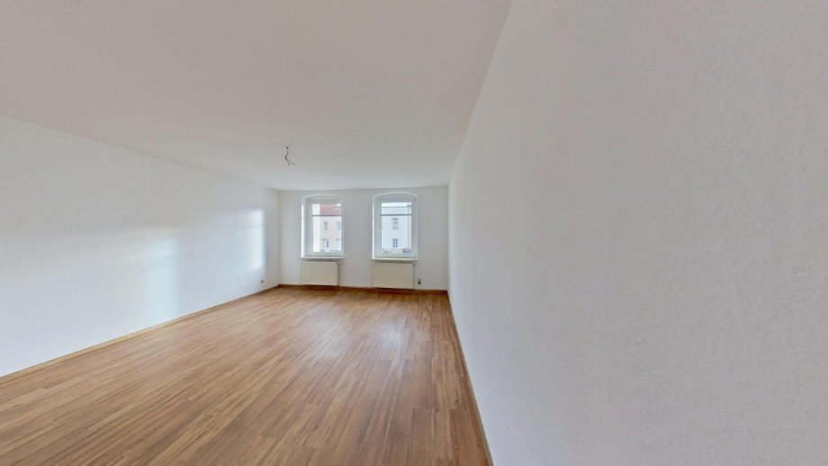 Wohnzimmer Erdgeschosswohnung K�then/ Anhalt