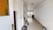 Durchfahrt Reihenhaus in Aken mit Renovierungsbedarf