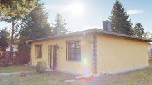 Seitenansicht Ohne K�uferprovision! Einfamilienhaus auf einer Ebene mit Garage, Werkstatt und Garten