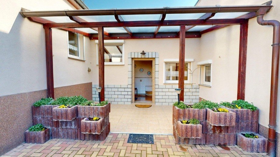 Eingangsbereich mit Veranda Doppelhaush�lfte Scheuder