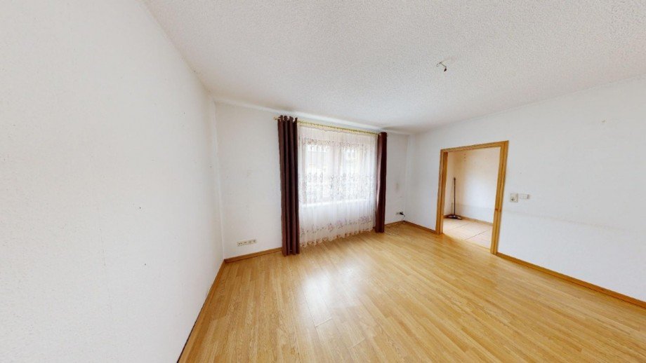 Wohnzimmer im EG Reihenmittelhaus Aken